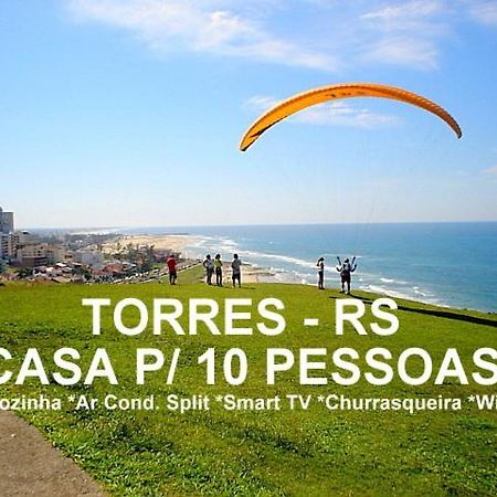 הוילה Casa De 2 Quartos Com 2 Ares-Condicionados Em Torres-Rs - Na Mais Bela Praia Gaucha - Cozinha - Banheiro - Tv Smart 32 E Wi-Fi - Estacionamento - Anfitria Superhost No Bnb מראה חיצוני תמונה