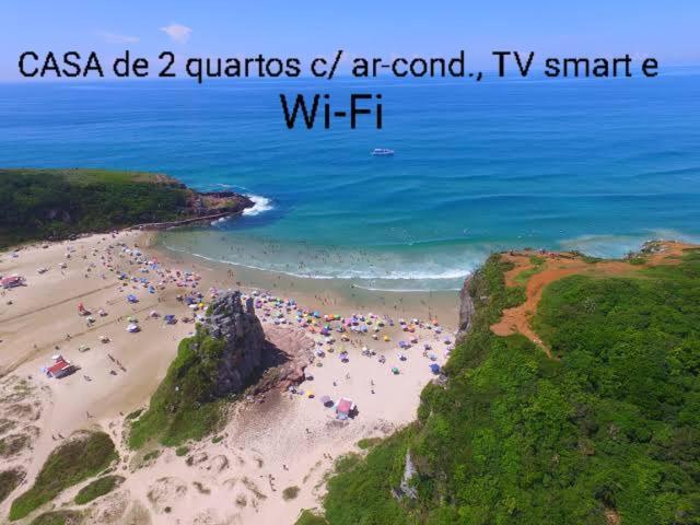 הוילה Casa De 2 Quartos Com 2 Ares-Condicionados Em Torres-Rs - Na Mais Bela Praia Gaucha - Cozinha - Banheiro - Tv Smart 32 E Wi-Fi - Estacionamento - Anfitria Superhost No Bnb מראה חיצוני תמונה