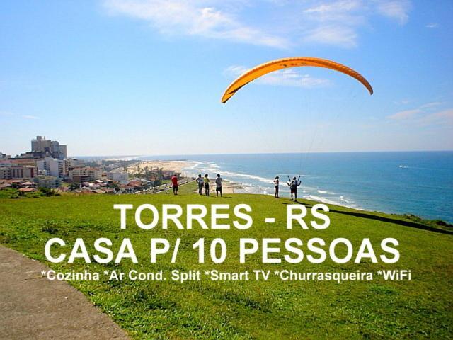 הוילה Casa De 2 Quartos Com 2 Ares-Condicionados Em Torres-Rs - Na Mais Bela Praia Gaucha - Cozinha - Banheiro - Tv Smart 32 E Wi-Fi - Estacionamento - Anfitria Superhost No Bnb מראה חיצוני תמונה